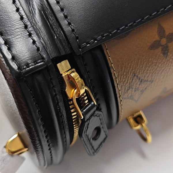 CANNES PM Monogram Coated Canvas Brown