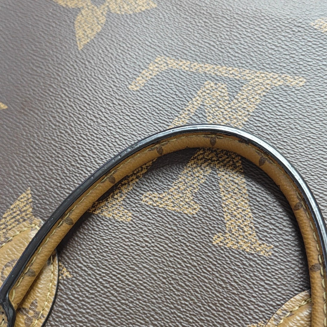 ONTHEGO MM Monogram Coated Canvas Brown