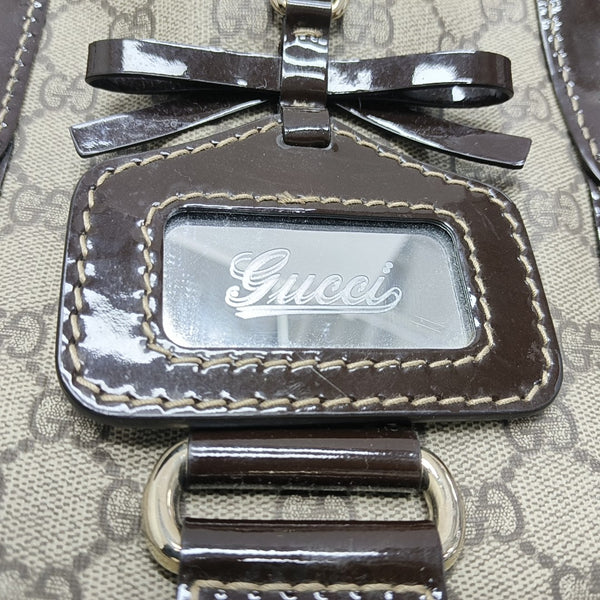 Monogram Coated Canvas Top Handle Bag Beige