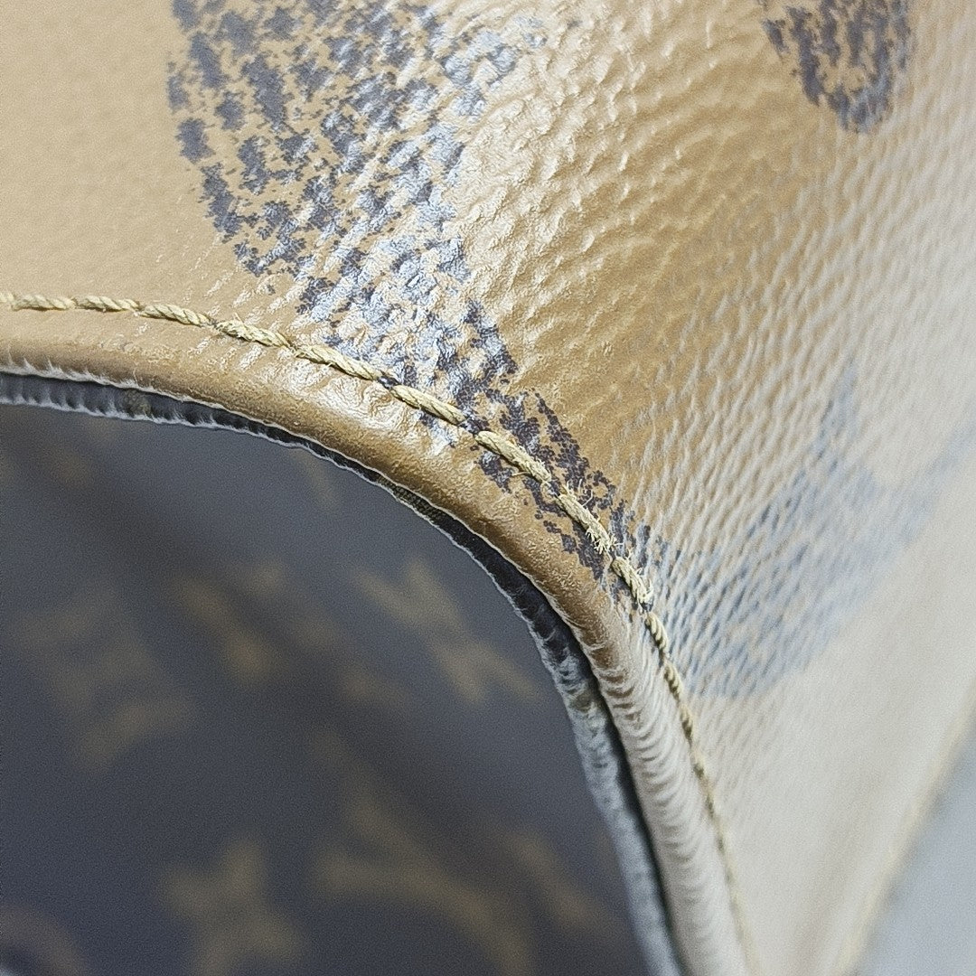 ONTHEGO MM Monogram Coated Canvas Brown