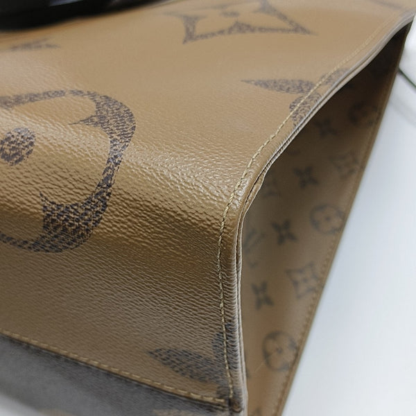 ONTHEGO GM Monogram Coated Canvas Brown