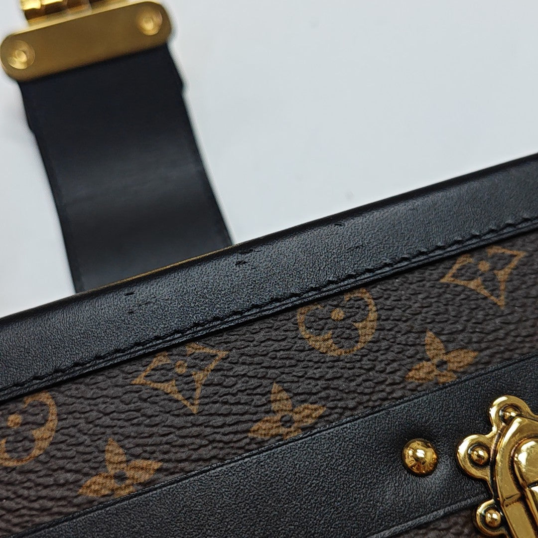 PETITE MALLE Monogram Coated Canvas Brown