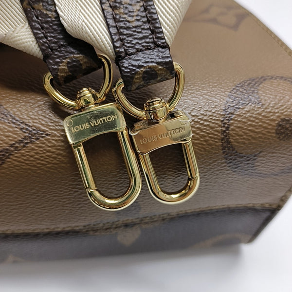 ONTHEGO PM Monogram Coated Canvas Brown