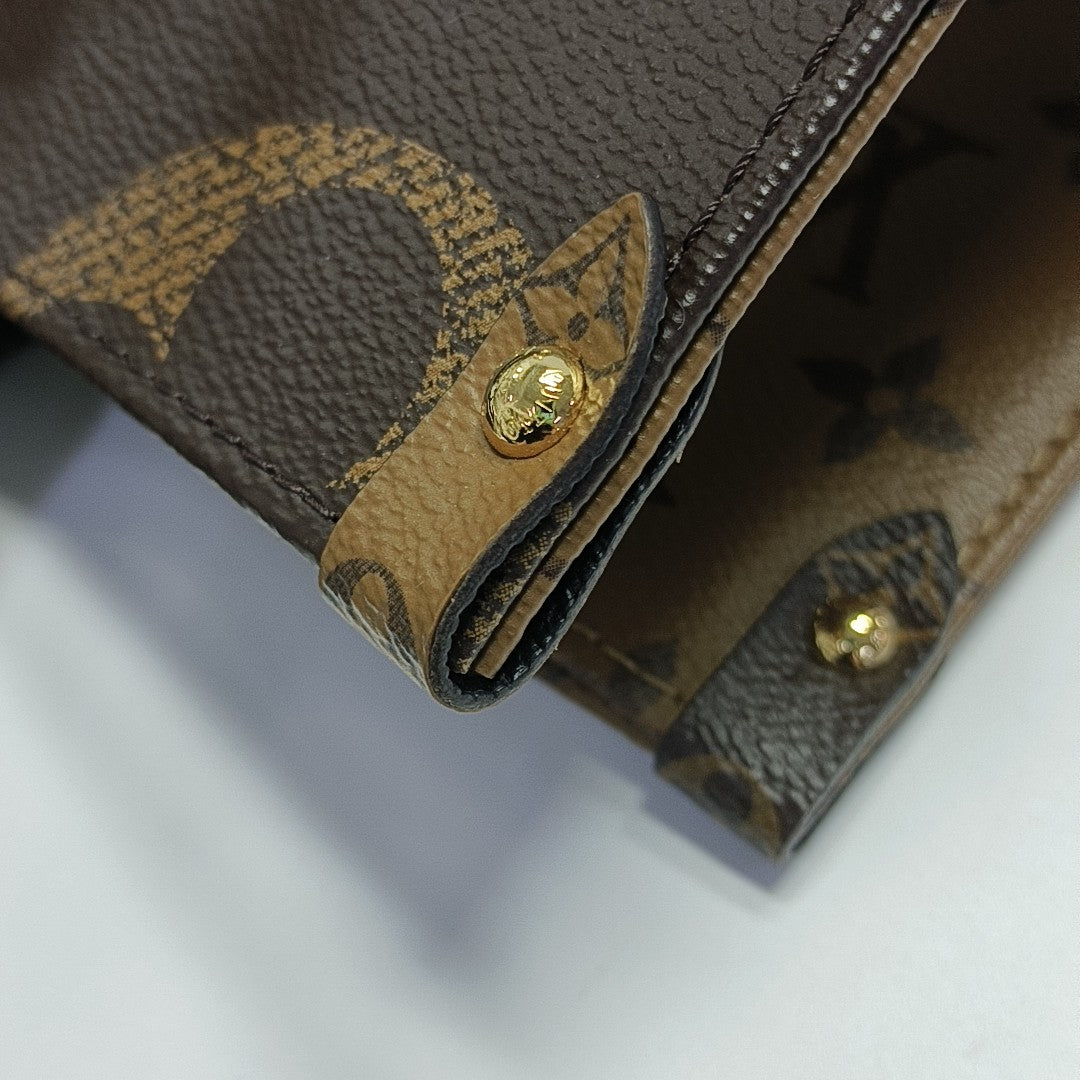 ONTHEGO MM Monogram Coated Canvas Brown
