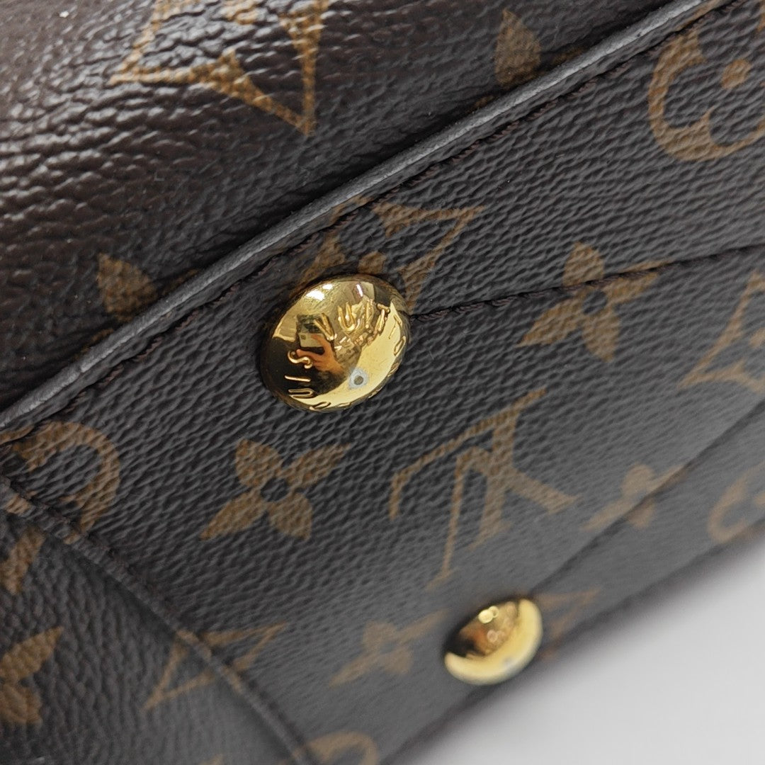 MONTAIGNE Monogram Coated Canvas Brown