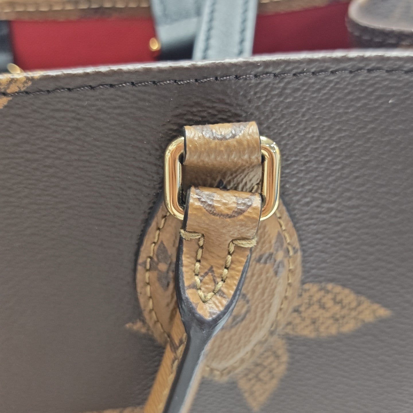 ONTHEGO MM Monogram Coated Canvas Brown