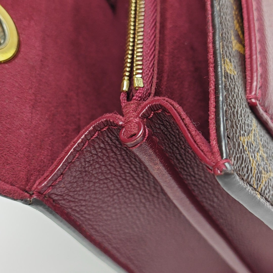 VICTOIRE Monogram Coated Canvas Brown