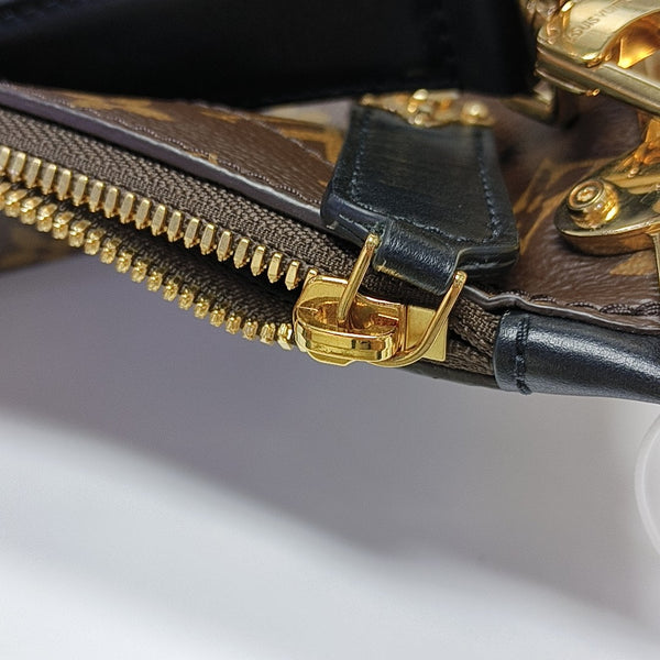 TRUNK Monogram Coated Canvas Brown