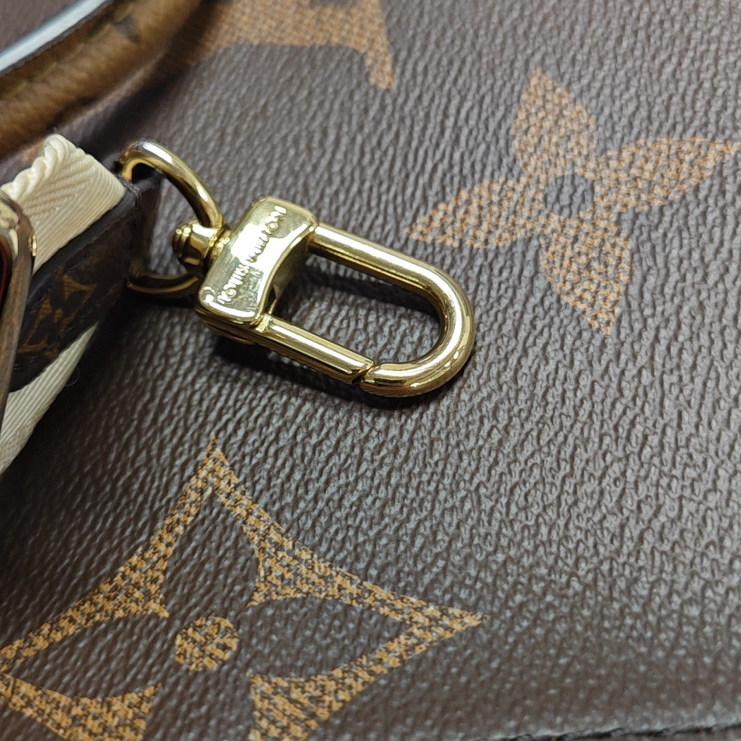 ONTHEGO PM Monogram Coated Canvas Brown