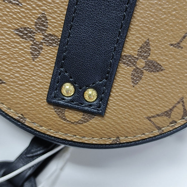 BOITE CHAPEAU Mini Monogram Coated Canvas Brown