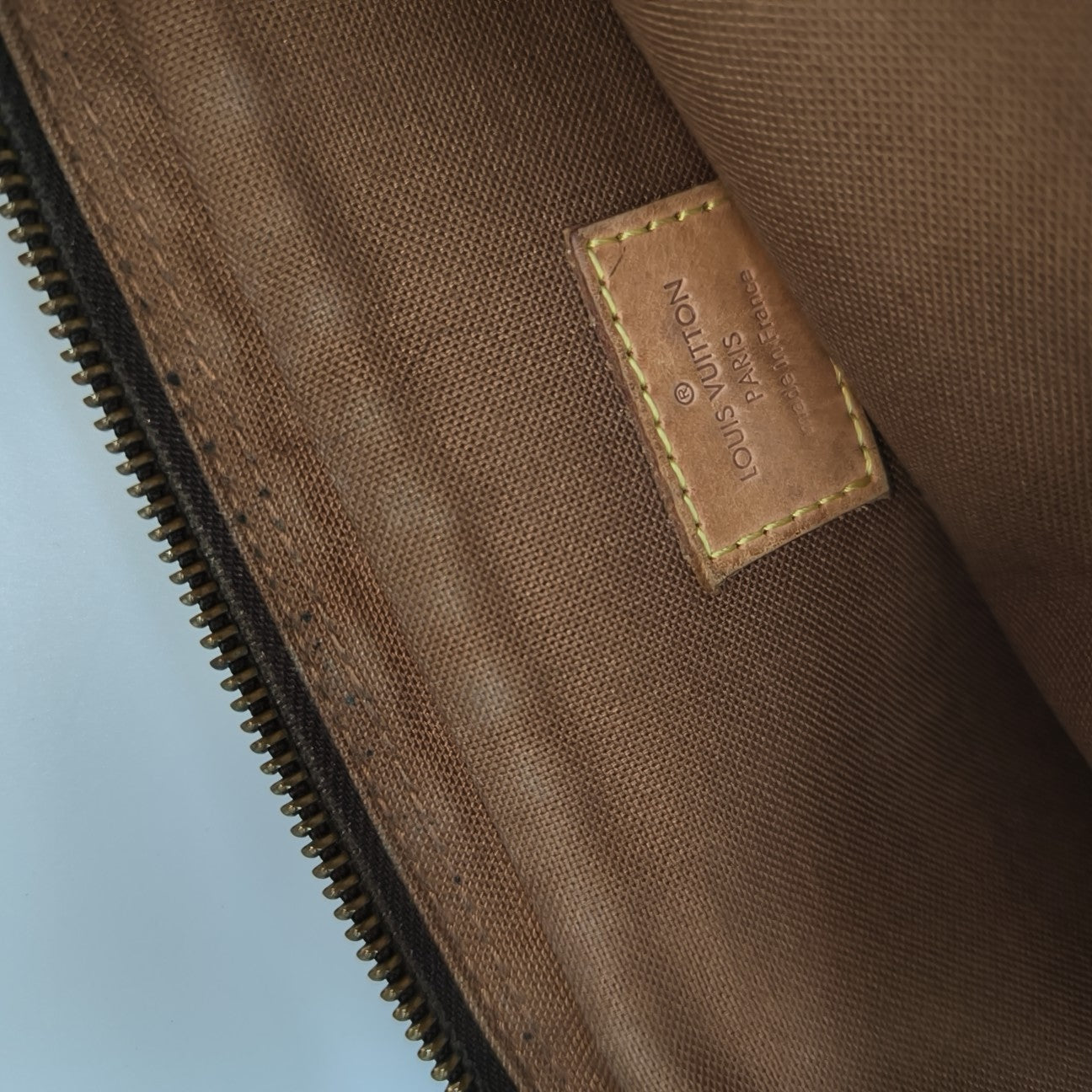 TROTTEUR Monogram Coated Canvas Brown