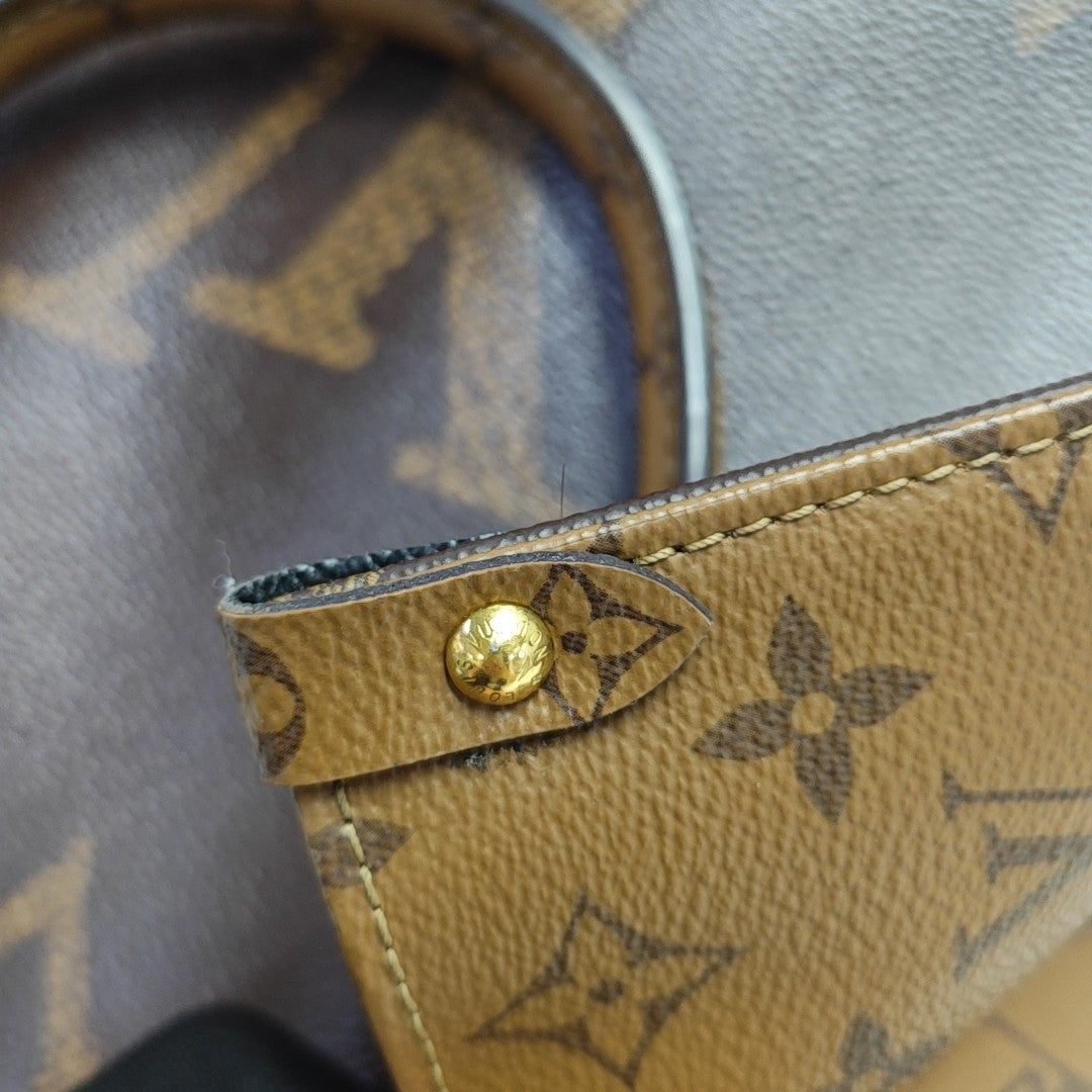 ONTHEGO MM Monogram Coated Canvas Brown