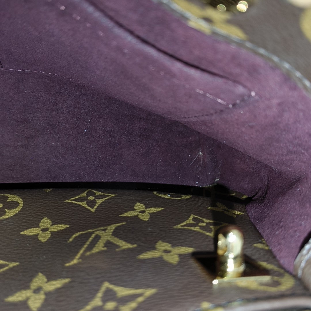 MONTAIGNE Monogram Coated Canvas Brown
