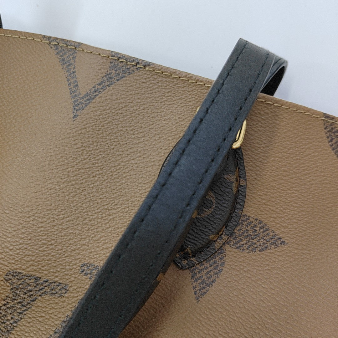 ONTHEGO MM Monogram Coated Canvas Brown