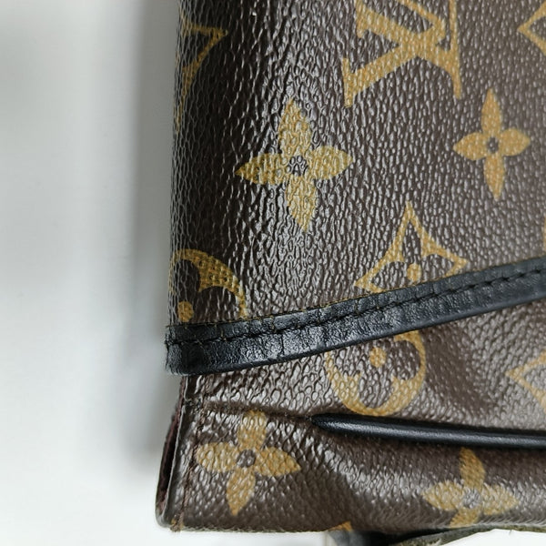 BASS Monogram Coated Canvas Brown