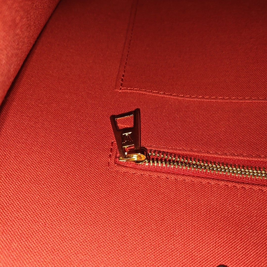 ONTHEGO GM Monogram Coated Canvas Brown