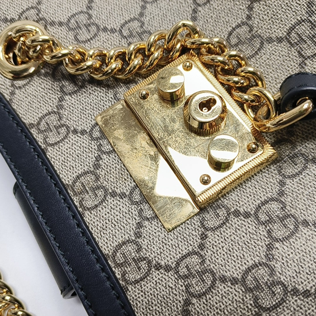 Padlock Small Monogram Coated Canvas Beige