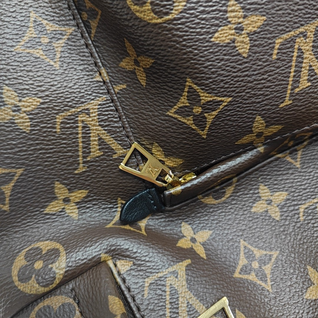 Monogram Coated Canvas Backpack Brown