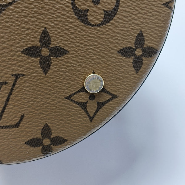 CANNES PM Monogram Coated Canvas Brown