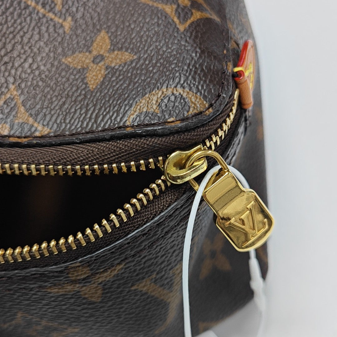Monogram Coated Canvas Clutch Brown