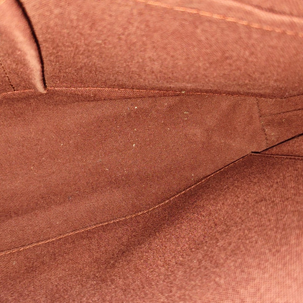 DISTRICT MM Monogram Coated Canvas Brown