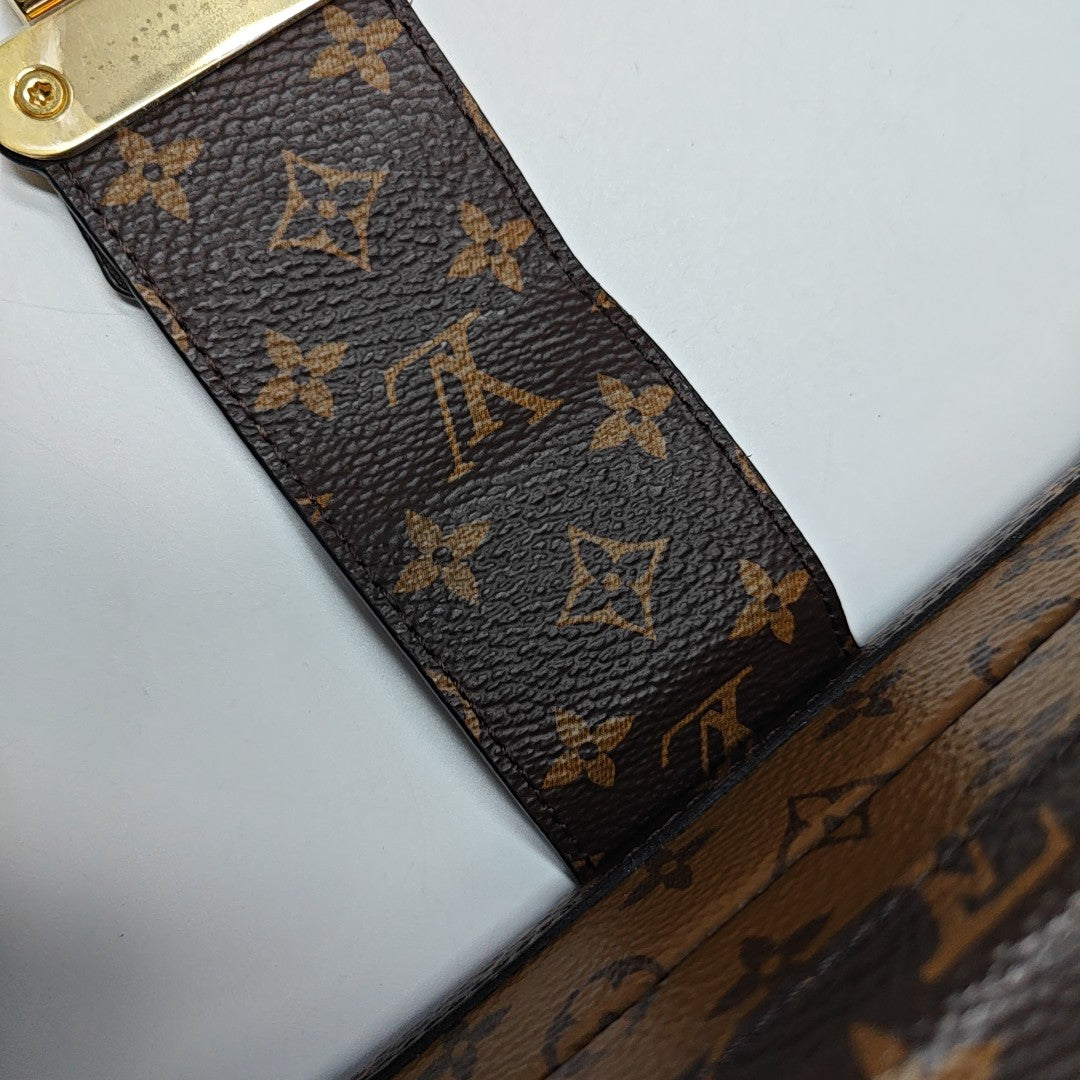 PETITE MALLE Monogram Coated Canvas Brown