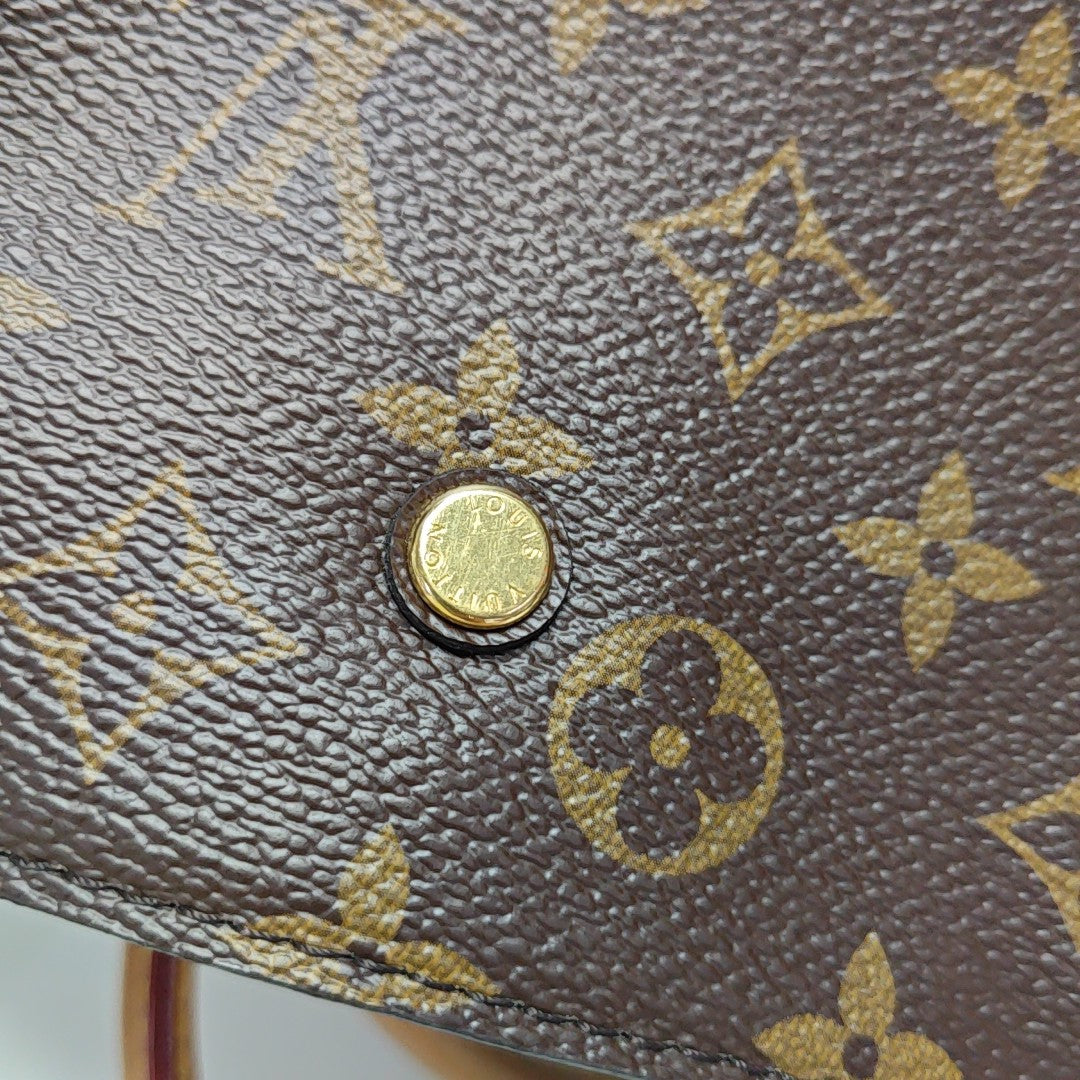 MONTAIGNE Monogram Coated Canvas Brown