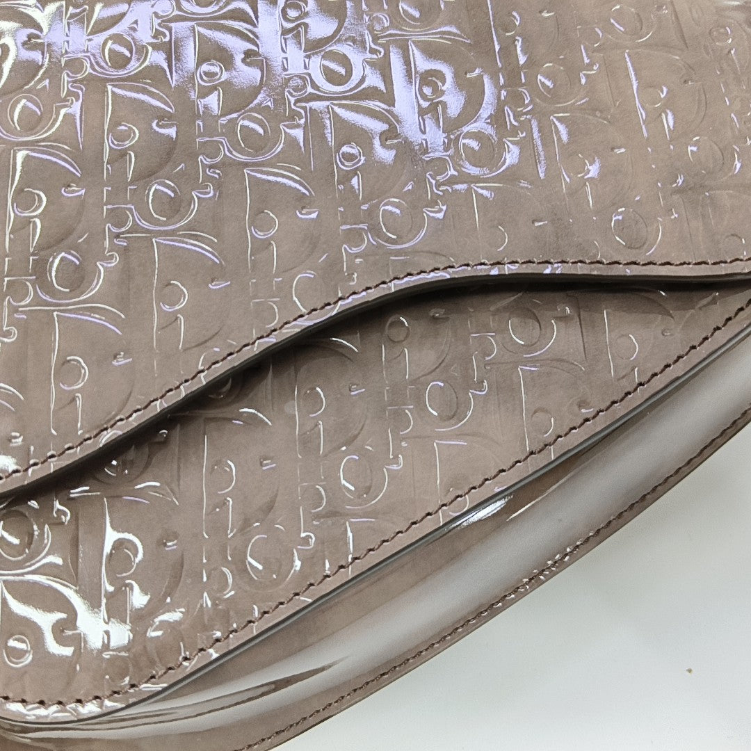Authenticated pre-owned  Saddle Monogram Patent Leather Grey - Shoulder Bag at Looply