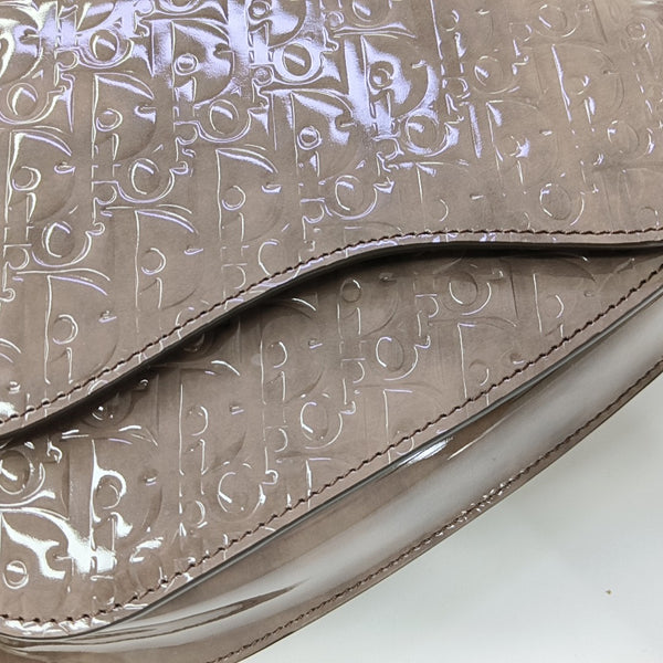 Authenticated pre-owned  Saddle Monogram Patent Leather Grey - Shoulder Bag at Looply