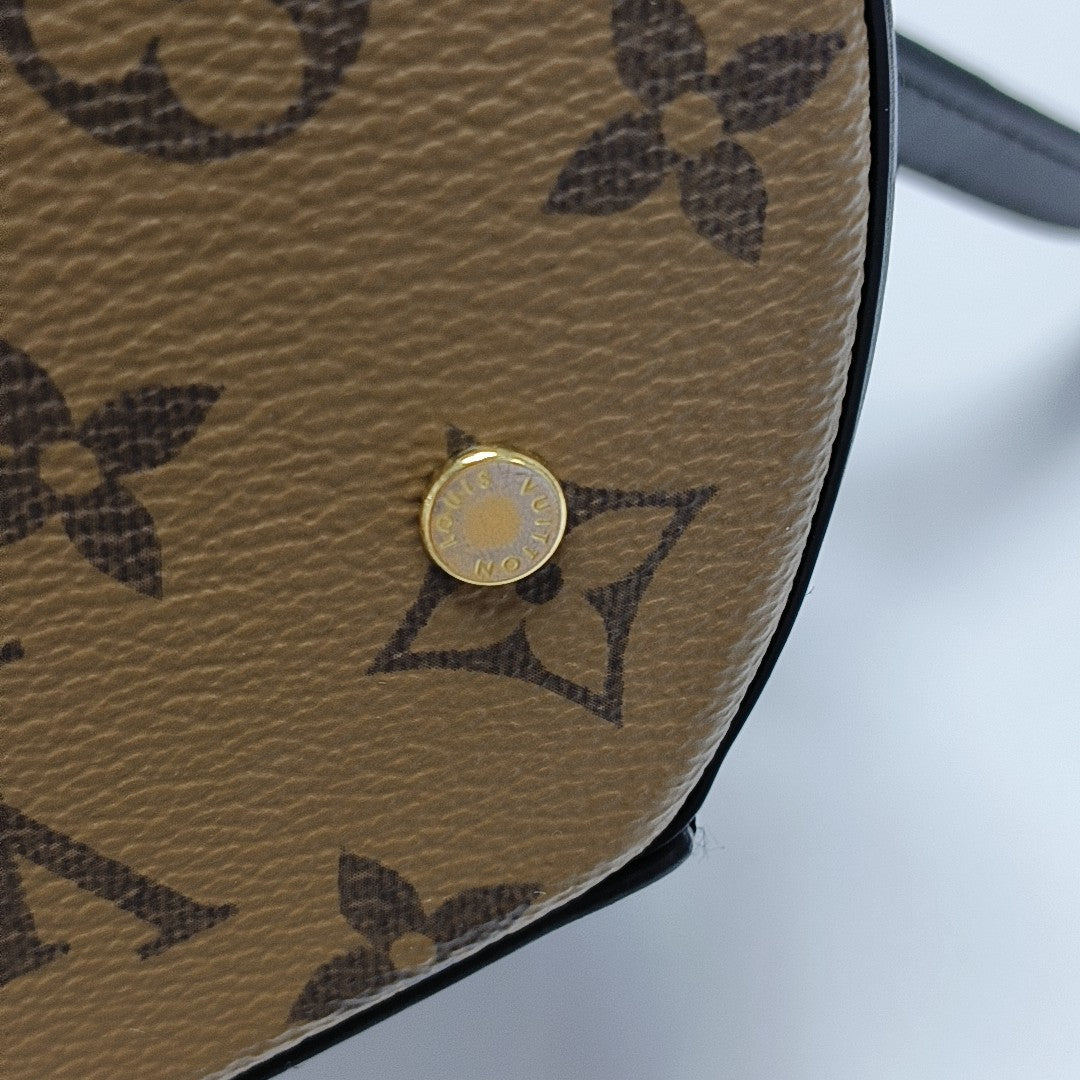 CANNES PM Monogram Coated Canvas Brown