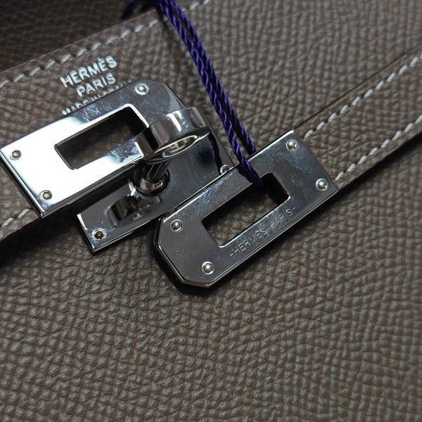 Authenticated pre-owned  Kelly Epsom Grey - Clutch at Looply