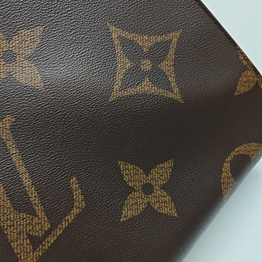ONTHEGO GM Monogram Coated Canvas Brown