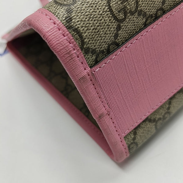 GG Bucket Monogram de lona revestida beige para niños