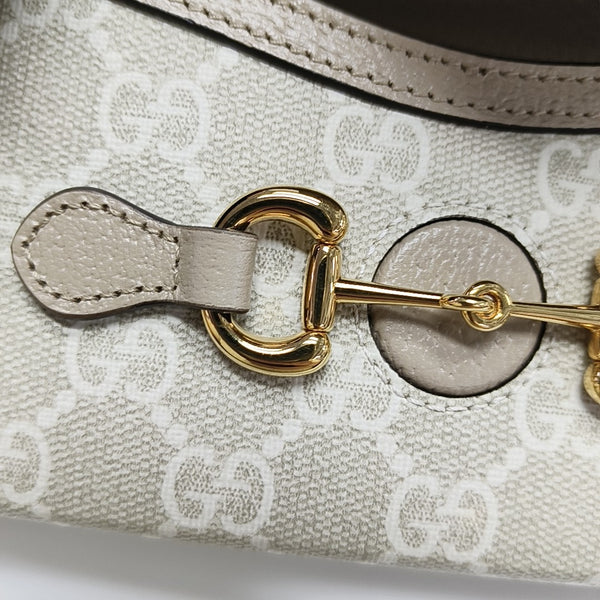 Authenticated pre-owned  Horsebit 1955 Mini Monogram Coated Canvas Beige - Crossbody Bag at Looply