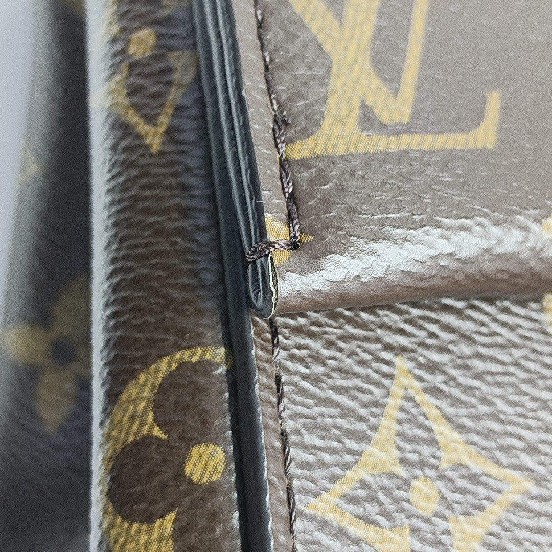 CLUNY 20 Monogram Coated Canvas Brown