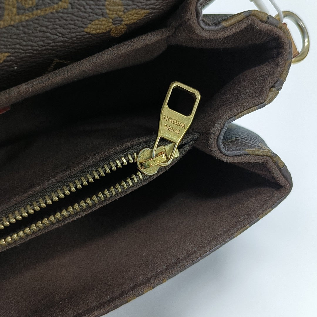 MÉTIS EAST WEST Monogram Coated Canvas Brown