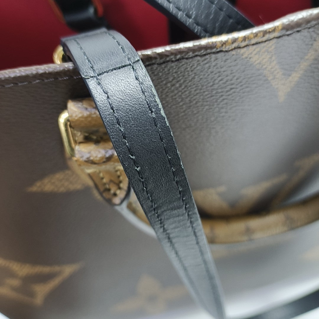 ONTHEGO MM Monogram Coated Canvas Brown