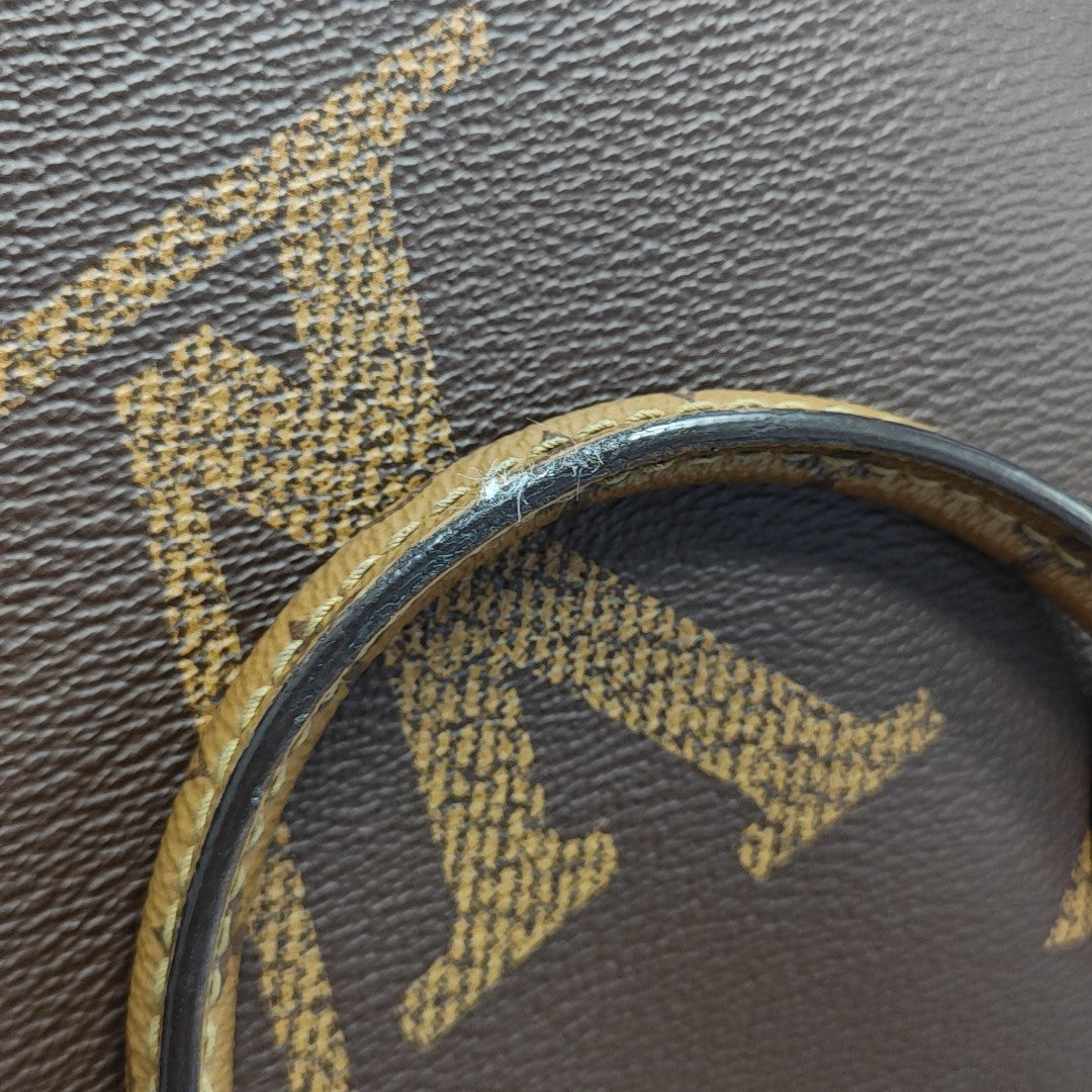 ONTHEGO MM Monogram Coated Canvas Brown
