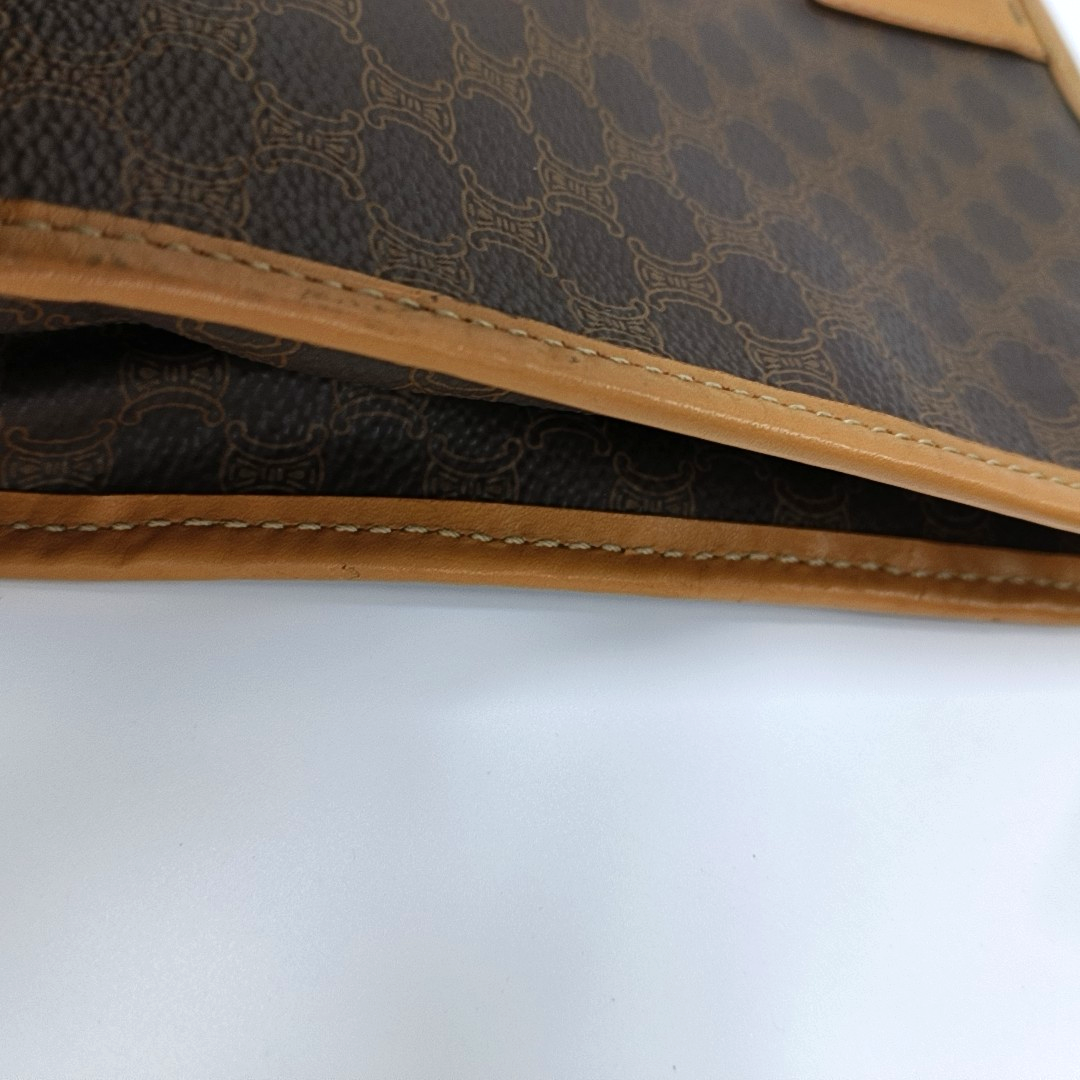 Authenticated pre-owned  MACADAM CLUTCHE Coated Canvas Brown - Clutch at Looply