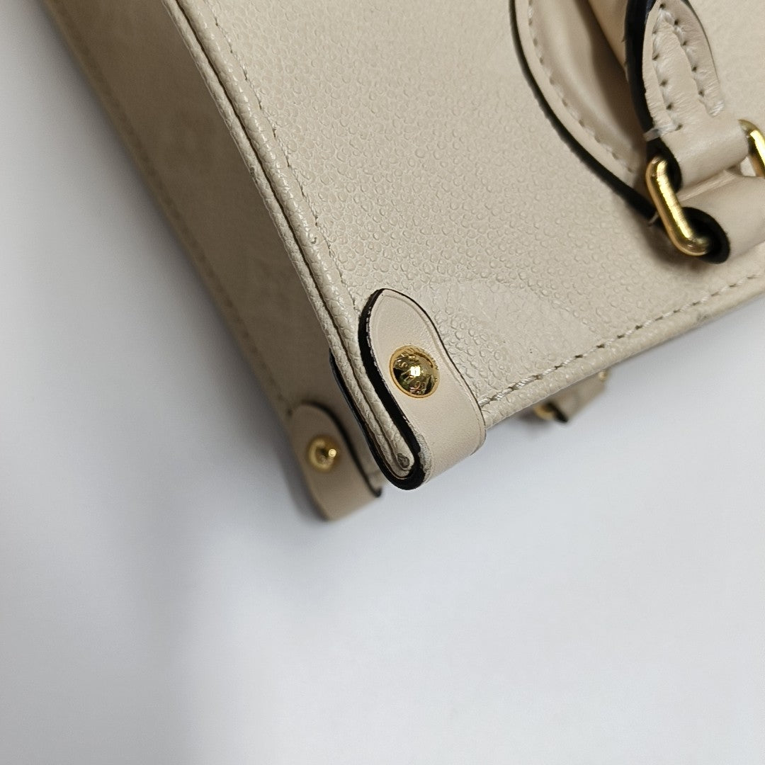 ONTHEGO PM Monogram Calfskin Beige
