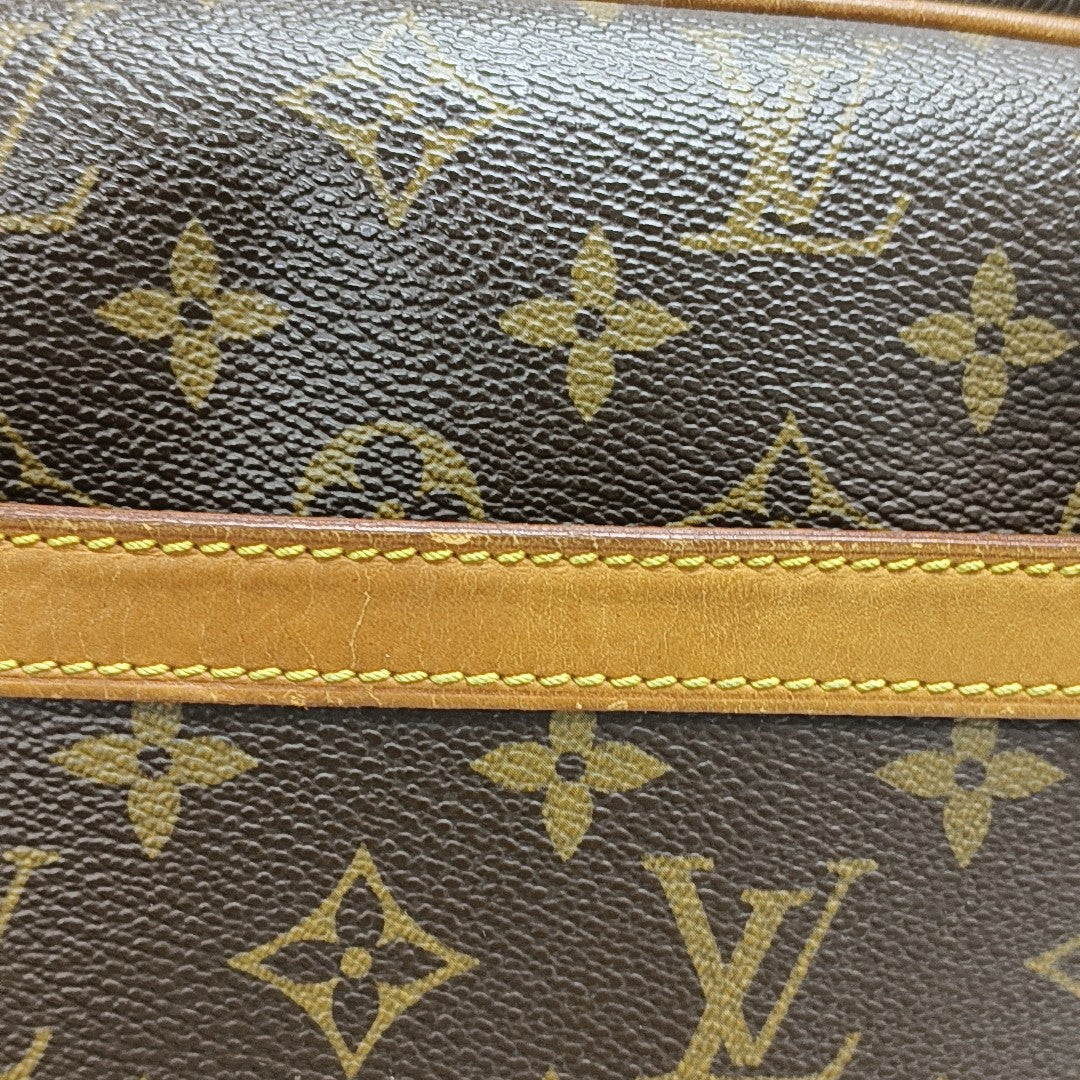 REPORTER Monogram Coated Canvas Brown