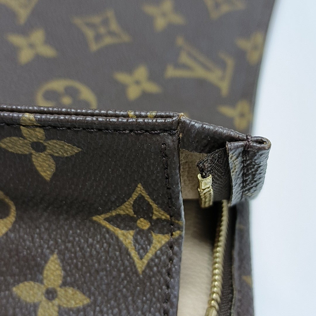 TOILET POCKET 26 Monogram Coated Canvas Brown