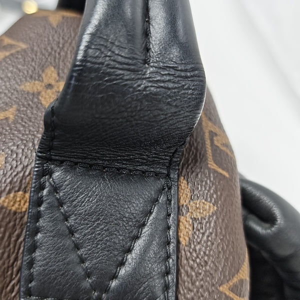 Monogram Coated Canvas Backpack Brown