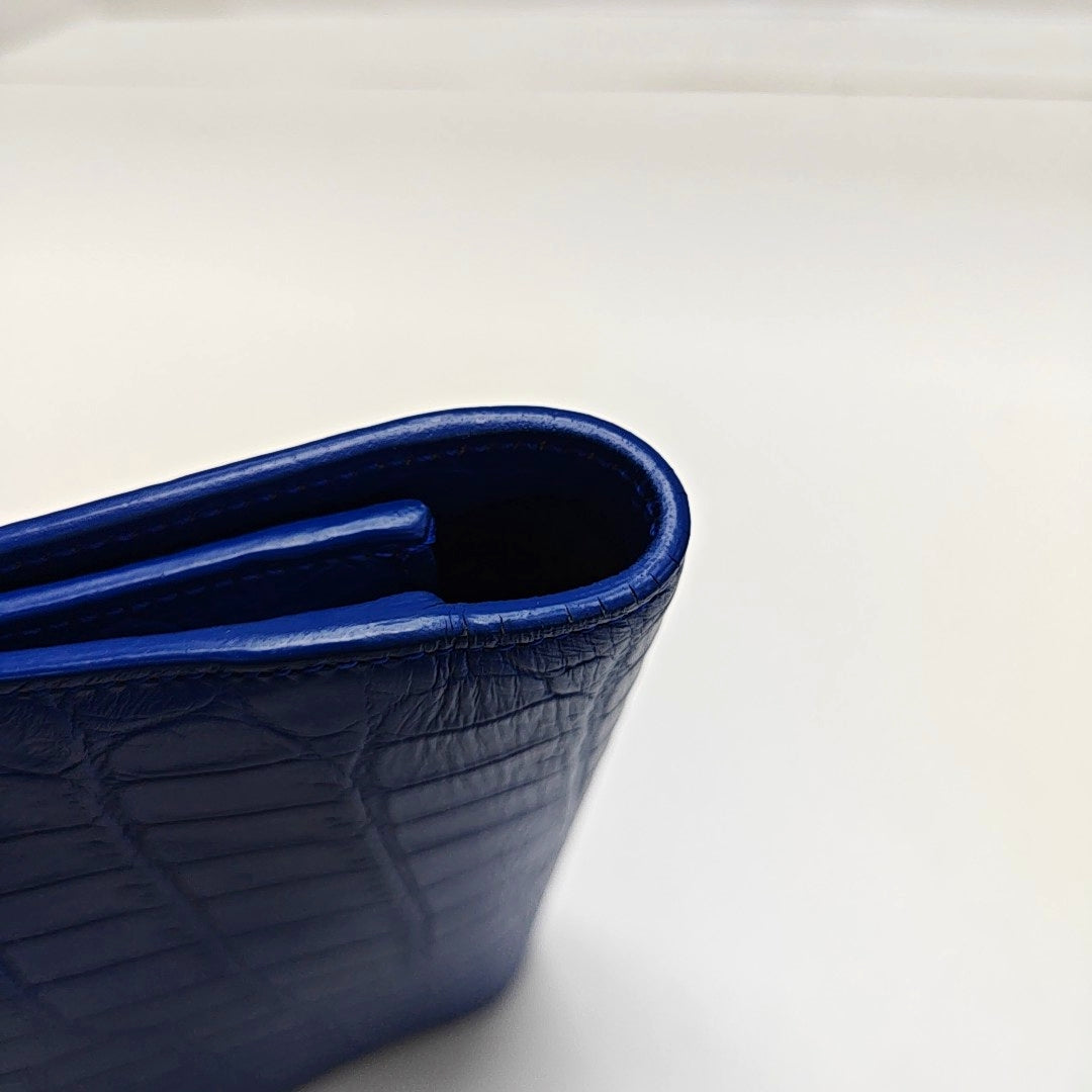 Authenticated pre-owned  KATE Medium Calfskin Blue - Clutch at Looply
