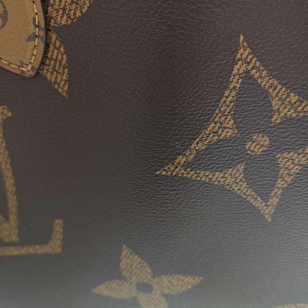 ONTHEGO MM Lona Monogram Revestida Marrón