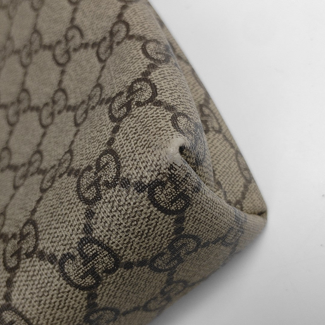 Monogram Coated Canvas Clutch Beige