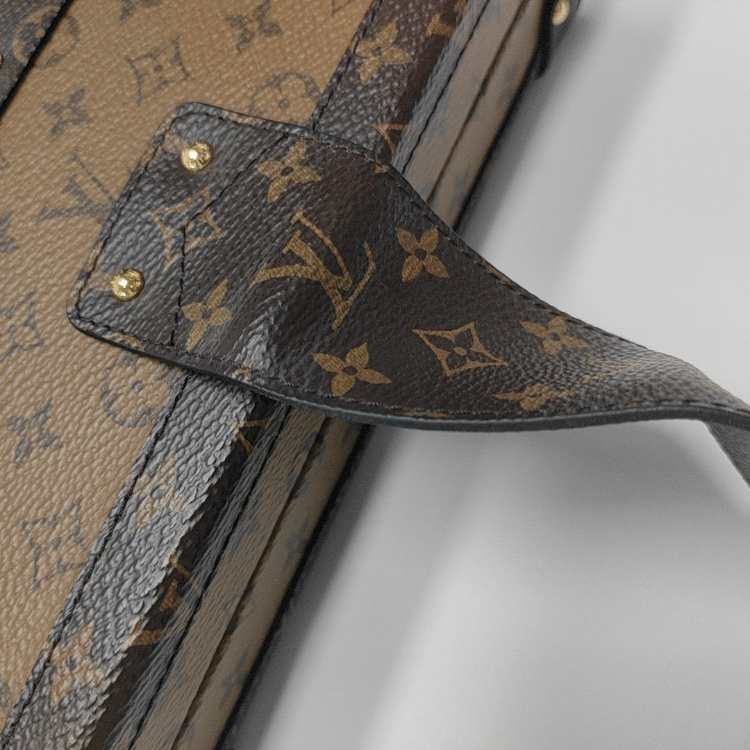 PETITE MALLE Monogram Coated Canvas Brown