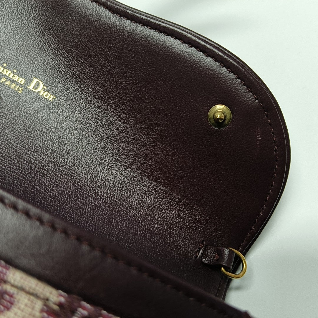 Authenticated pre-owned  Saddle Oblique Canvas Red - Shoulder Bag at Looply