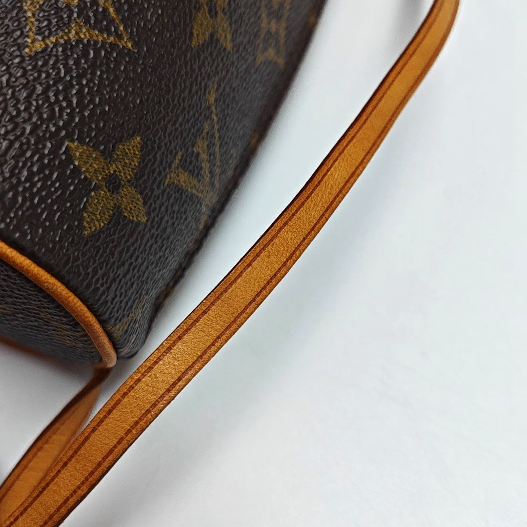 Authenticated pre-owned  PAPILLON Mini Monogram Coated Canvas Brown - Top Handle Bag at Looply