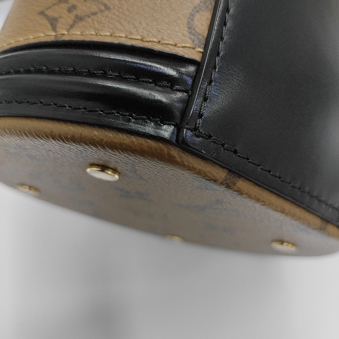 CANNES PM Monogram Coated Canvas Brown